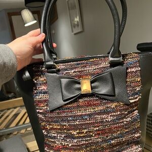 Gently used tweed black/ multi color handbag with bow.